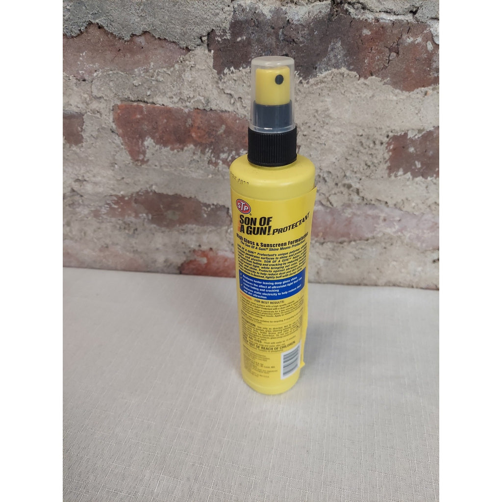 STP Son Of A Gun Protectant Spray Shines Protects Vinyl Rubber Plastic 10 FL OZ