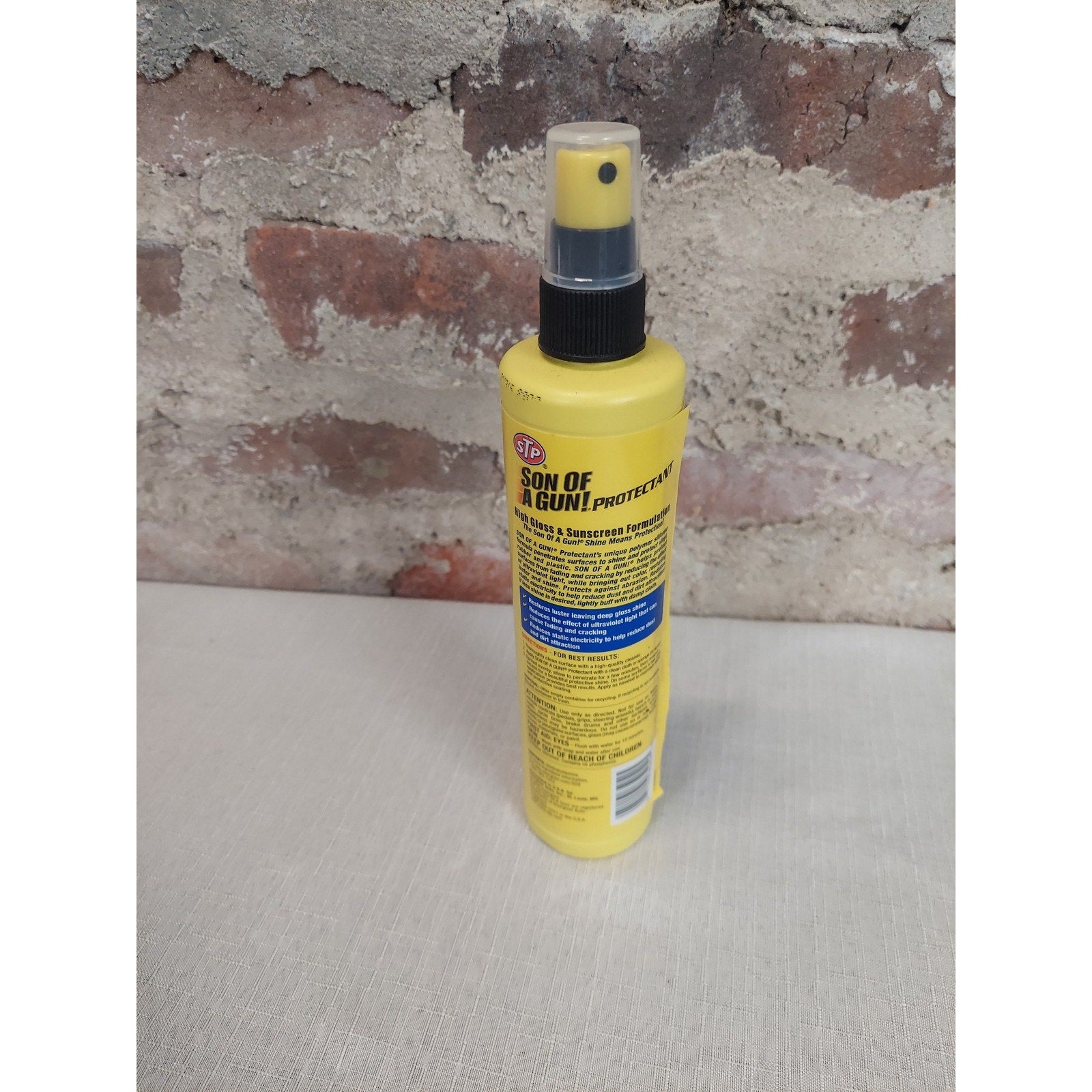 STP Son Of A Gun Protectant Spray Shines Protects Vinyl Rubber Plastic 10 FL OZ